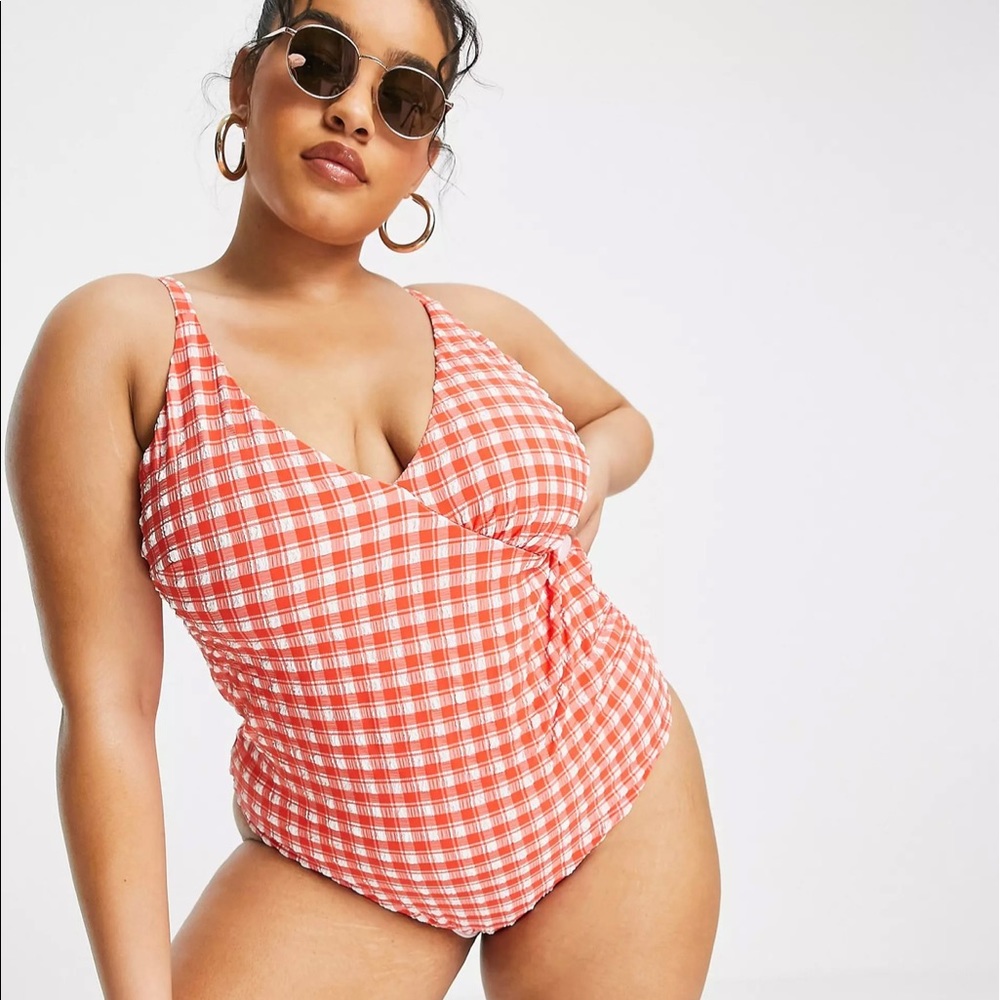 ASOS Design Curve seersucker swimsuit in red.